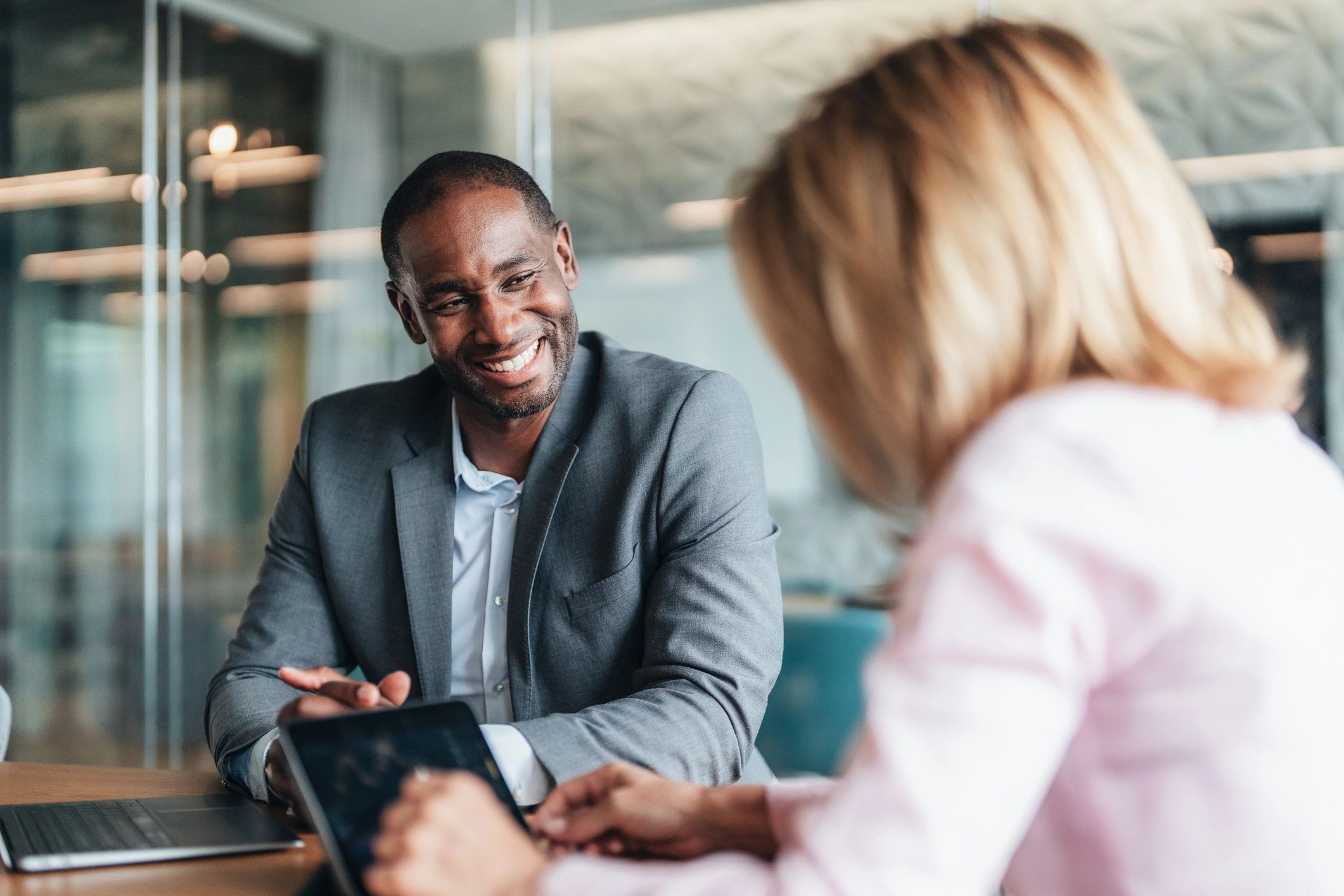 Point One Consulting team collaborating in a modern office